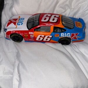 Die cast replica of the #66 Big Kmart Ford Taurus driven by Darrell Waltrip.